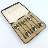 A set of six George V silver gilt and enamelled coffee spoons, William Hutton, Birmingham 1932