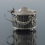 A Victorian silver reticulated mustard pot, William Hutton and Sons, London 1895