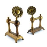 Thomas Jeckyll (attributed), a pair of Aesthetic Movement brass andirons or fire dogs