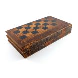 A Victorian leather bound book games board