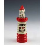 George Tinworth for Doulton, a mouse chess piece, red rook