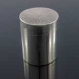 A Modernist silver tea caddy, Neal Lovesey, London 1972, cylindrical form with textured bark