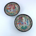 A pair of 19th Century Cantonese enamel soup dishes, gilt and polychrome decorated with domestic