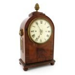 A Regency flame mahogany musical bracket clock of large proportions, circa 1820, brass acorn