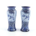 William Moorcroft for James Macintyre, a pair of Florian blue on blue hesperian lilac vases,