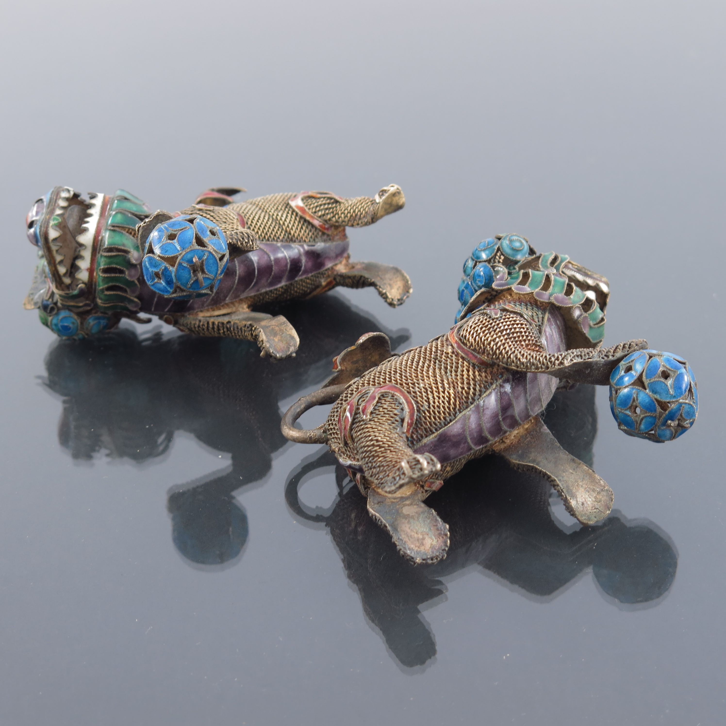 A pair of Chinese silver gilt and enamelled lion figures - Image 4 of 4