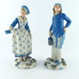 A pair of late 19th Century European hard paste figurines, circa 1880, modelled as a standing lady
