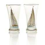 A pair of enamelled glass lemonade glasses, circa 1940