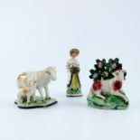 Staffordshire figure of a ewe bocage, a pearlware figure of two sheep