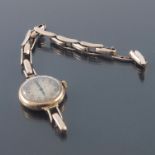 Elgin, a lady's early 20th century 9ct gold wrist watch, silvered circular dial, expanding strap,