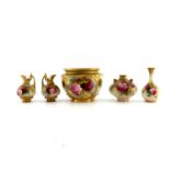 A collection of Royal Worcester rose painted vessels