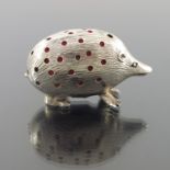 An Edwardian silver novelty pin cushion, Birmingham 1904, modelled in the form of a Hedgehog, the