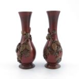 A pair of Japanese bronze baluster vases