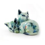 Charles Noke for Royal Doulton, an experimental Flambe glazed figure group of cats