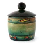 William Moorcroft, a Flambe Banded Fish tobacco jar and cover,