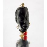 An Italian gem-set carved blackamoor pendant