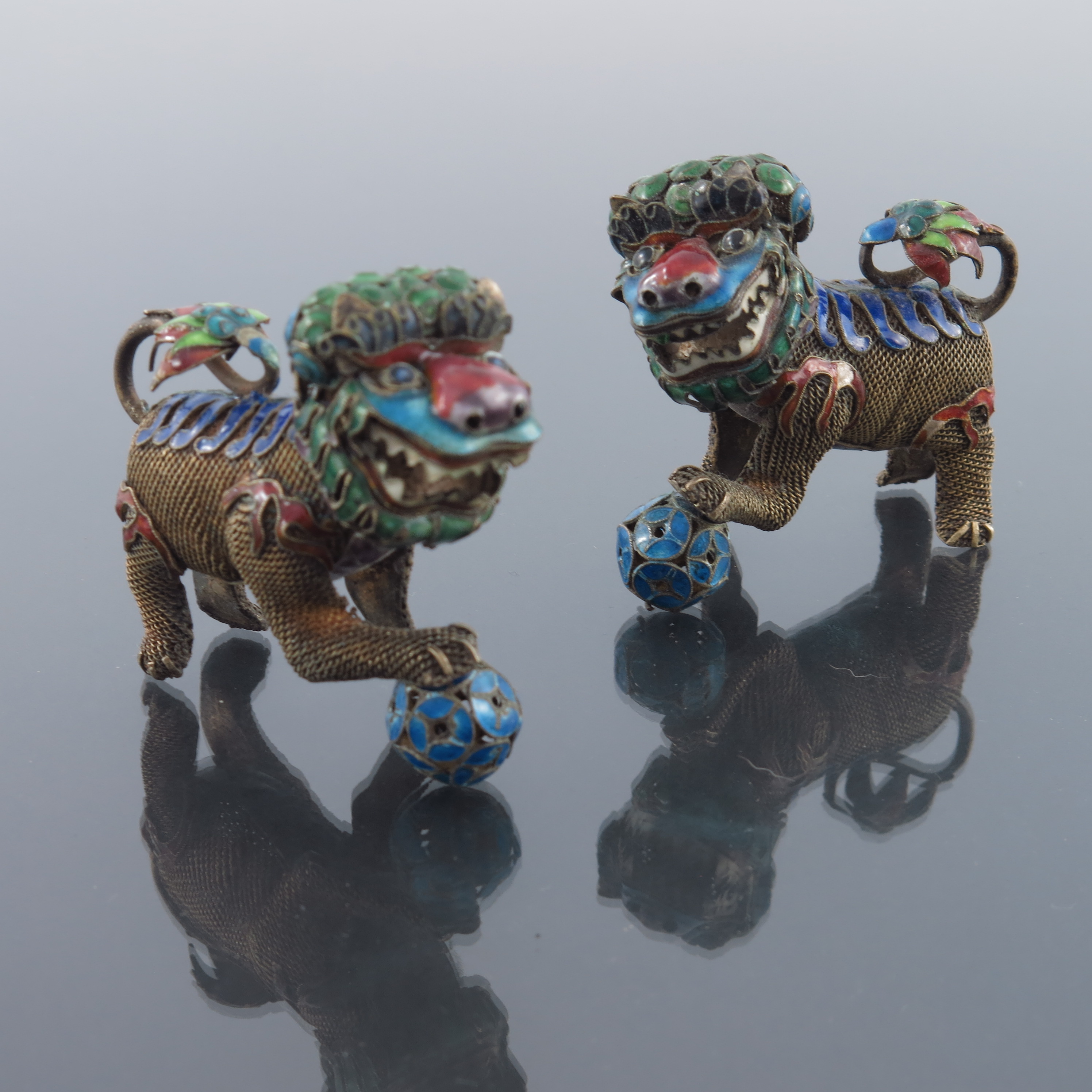 A pair of Chinese silver gilt and enamelled lion figures - Image 2 of 4