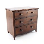 A George III oak and mahogany fronted miniature apprentice chest