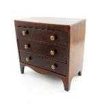 A George III mahogany miniature apprentice chest of three long drawers
