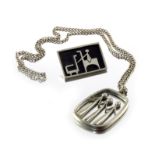 Roland Landerholm, a Swedish Modernist pewter pendant and brooch