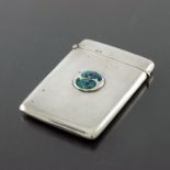 Archibald Knox for Liberty and Co., an Arts and Crafts silver and enamelled card case