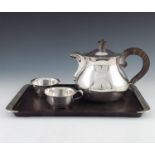 A German Art Deco silver four piece matched tea set, Bruchmann and Sohn and Kaeser and Uhlmann,