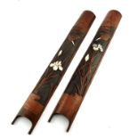 A pair of Japanese carved bamboo ivory and mother of pearl wall hangers