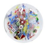 Saint Louis, a scrambled millefiori glass paperweight