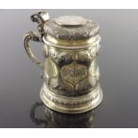 A 17th century German silver and parcel gilt lidded tankard, Johann Kartenbusch, Nuremberg