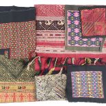 Asia/Laos: Miscellaneous woven and embroidered textiles to include a small cover or mat, woven in si