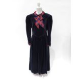 A vintage navy-blue velvet full length dress by ANABELINDA of Oxford, a boutique known for its quali