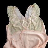 A quantity of pastel silk and other lingerie and nightwear, and a buttermilk cream silk fringed shaw