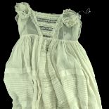 Two 19th century fine cotton lawn Christening gowns, both particularly long in the skirts, the first