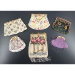 1900’s to the 30’s, six evening bags with a floral theme, the largest with opaque beaded background