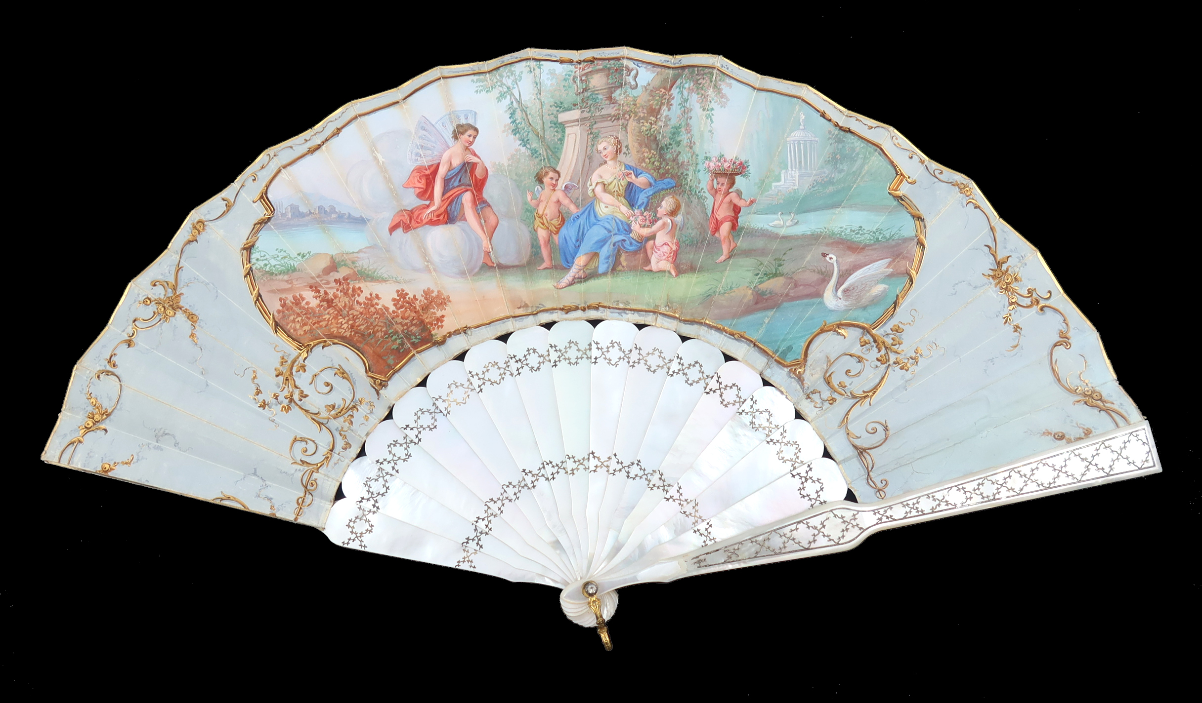 A last quarter 19th century white Mother of Pearl fan, gilded and silvered with a decorative lattice