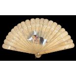 A very late 19th century wood brisé autograph fan, painted centrally with an angel visiting a lady,