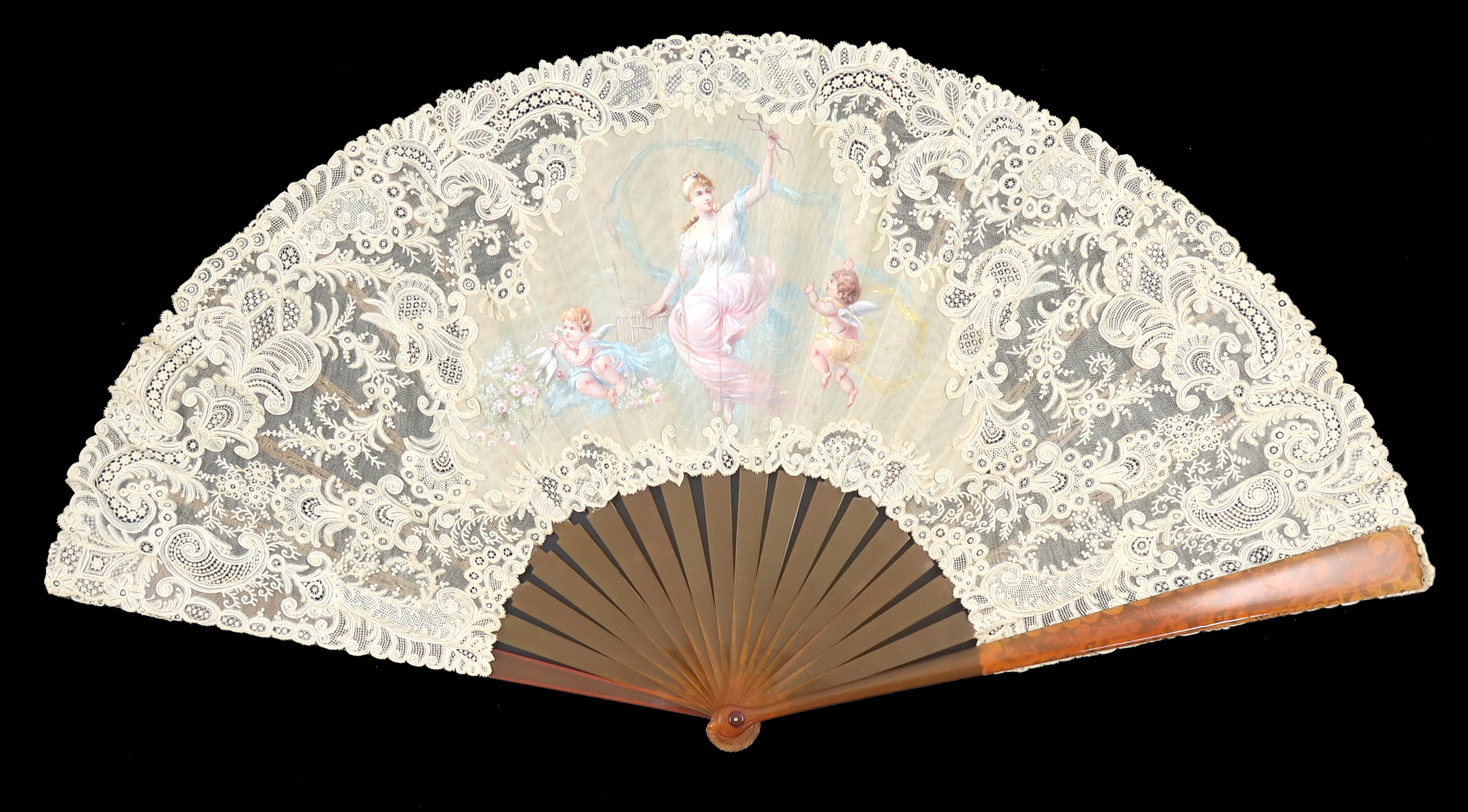 An exquisite, large, Brussels Point de Gaze needle lace fan mounted on blonde tortoiseshell or resin