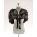 A 1940’s silver fox fur shoulder cape with feet as ties, lined in black crepe, nect to waist length