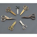 Antique Scissors: Seven pairs of miniature scissors, two shaped as storks, presumably for dolls, dif