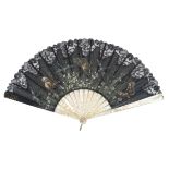 An early 20th century pink mother of pearl fan, the black gauze leaf, mounted à l’Anglaise, with a t