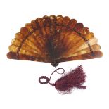 A An elegant circa 1880’s tortoiseshell brisé fan with good mottling, the seventeen inner sticks and