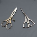 Antique Scissors: a pair of adjustable buttonhole scissors marked W. Bohm Solingen, lightly gilded o