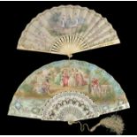 An early 20th century bone fan, lightly pierced and gilded, the monture with silk leaf painted in pa
