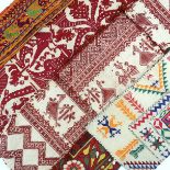 Eastern Mediterranean embroideries, comprising a small cotton cover with stylised designs worked in