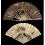 Two mid-19th century bone fans, both lithographed, the first featuring a musical gathering in the hi