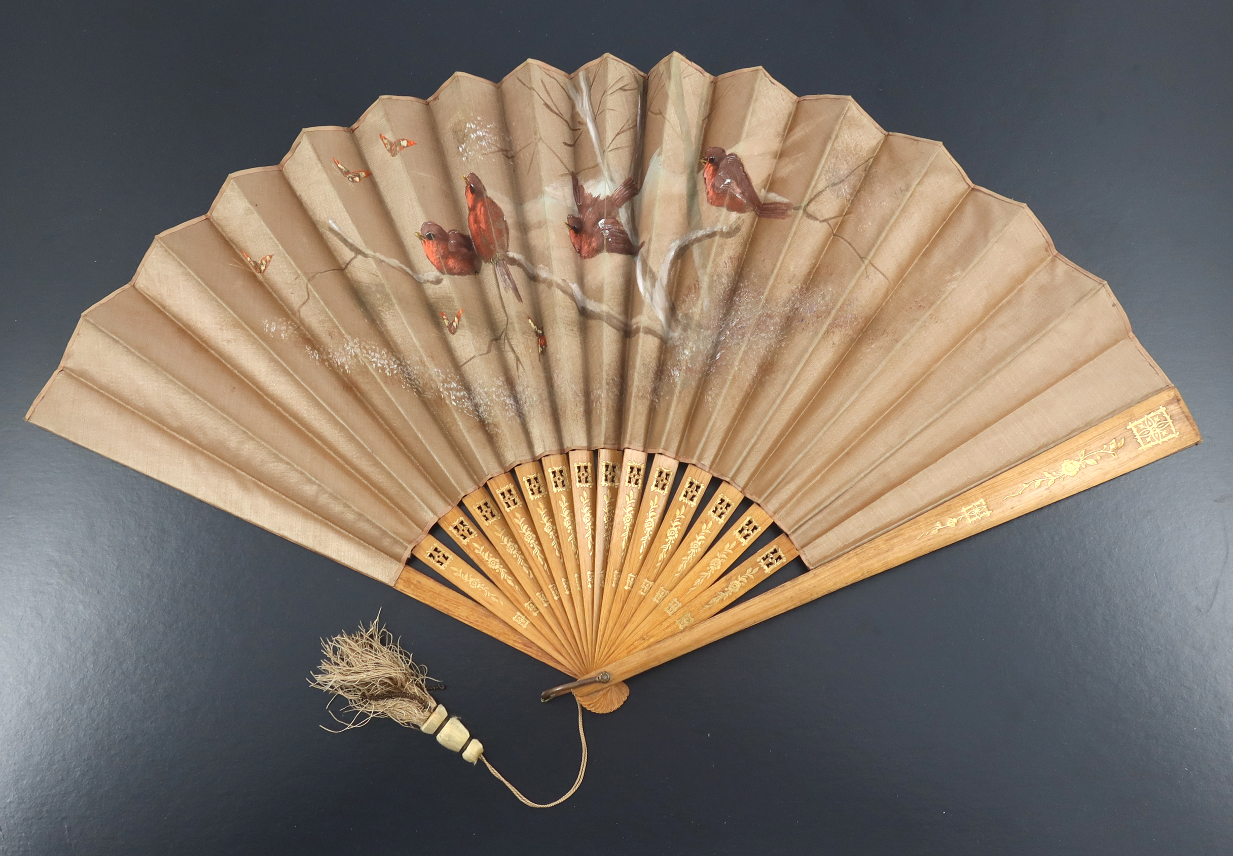 Three large wood fans from the 1890’s, the first with simple gilding to the monture, the taupe silk - Image 2 of 9