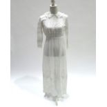 Two Edwardian whitework dresses, the first in fine lawn with long sleeves, insertion at the high wai