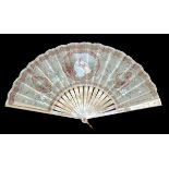 A very decorative fan c 1900 – 1910, the shiny pale pink Mother of Pearl gilded, the cream gauze lea