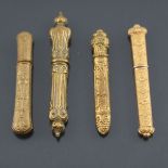 Four yellow metal 19th c needle cases, all with various degrees of embo