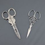 Antique Scissors: Two pairs of interesting scissors, the first quite fine with detailed design to th